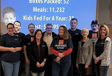 Minnwest team at feed my starving children event in Eagan, MN