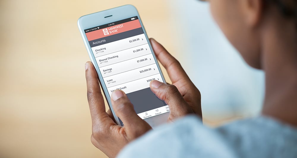 young-man-looking-at-mobile-screen