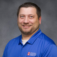 Headshot of Alex Ourada