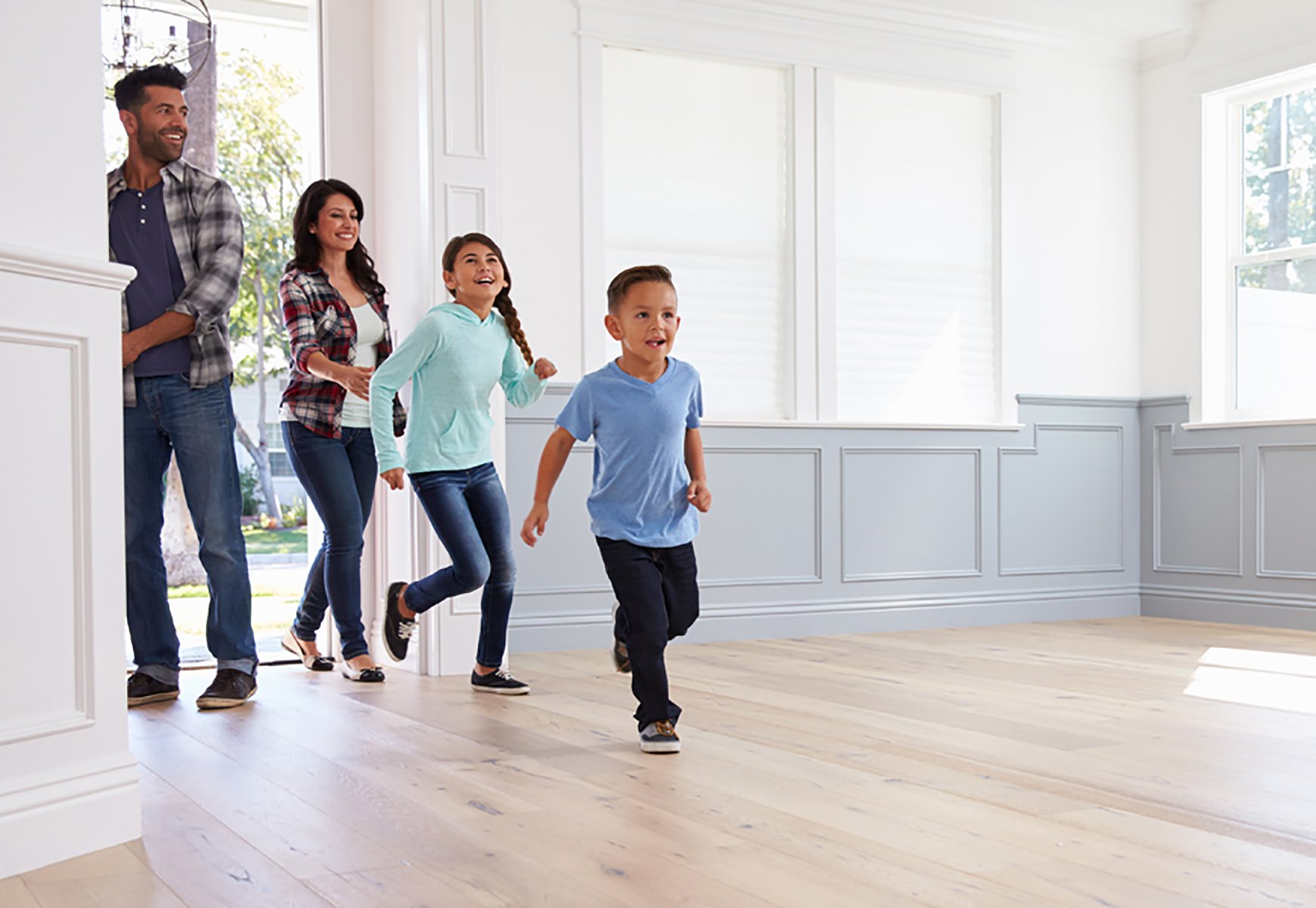 feature-Image-family-running-into-new-home
