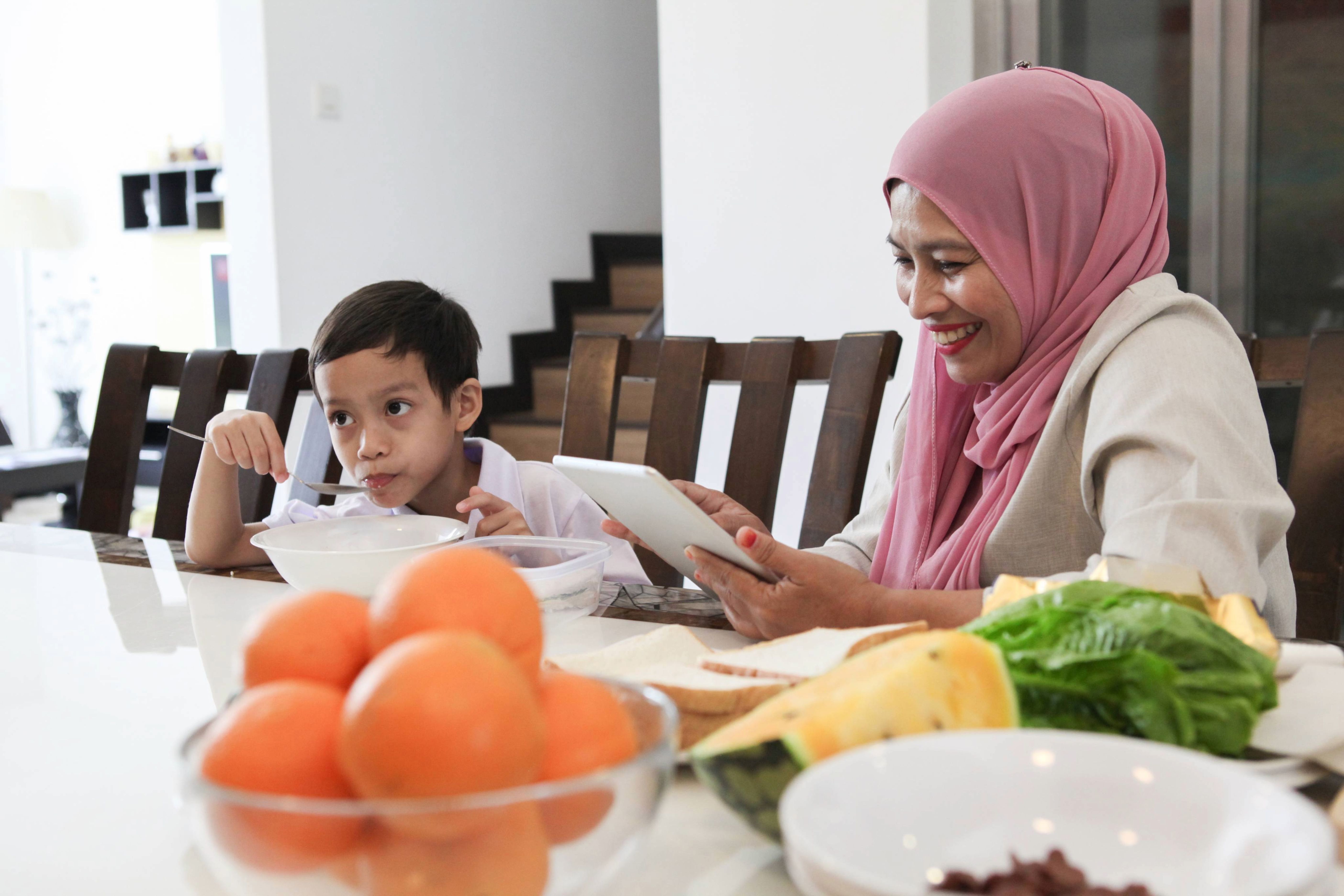 iStock-1183775350 - muslim mother and son having breakfast compressed